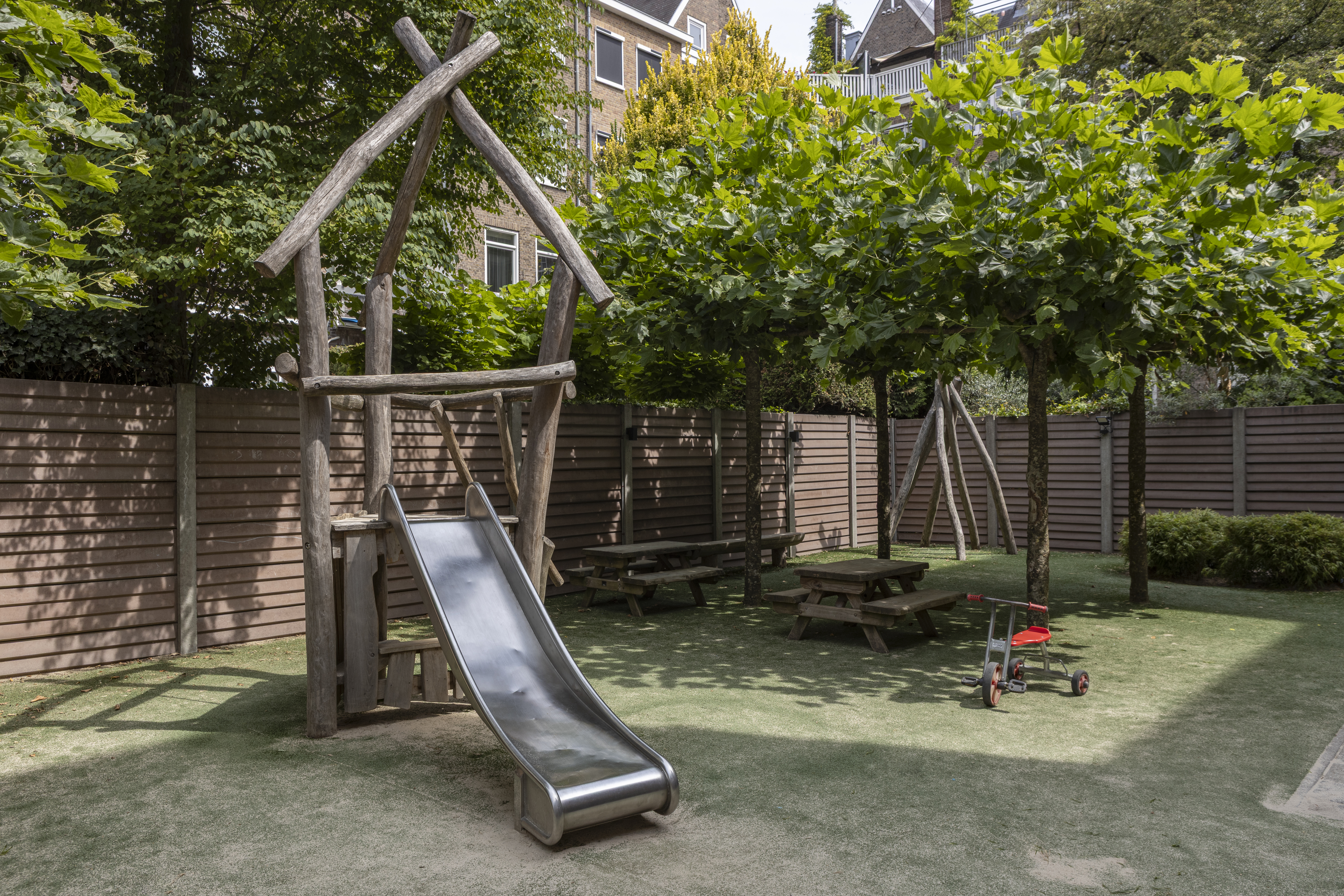 Compananny Kinderopvang Amsterdam Titiaan Kinderopvang Tuin Glijbaan Twee