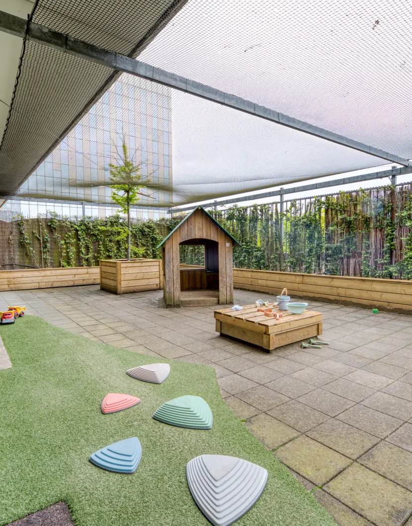 Tuin met grasveld kinderopvang kinderdagverblijf CompaNanny WFC